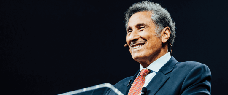 Dr. Michael A. Youssef standing at the podium.